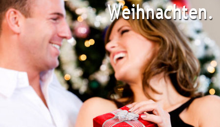Mann, Frau, rotes Geschenk,Weihnachtsbaum